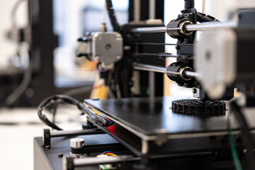 Fototapeta na wymiar 3D printer. Making plastic parts. Modern production technology.