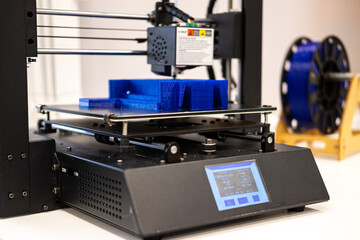 3D printer. Making plastic parts. Modern production technology.