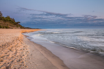 Travel photography of the Baltic sea coastline.Amazing sunrise over the Sea. Jastrzebia Gora, Poland.