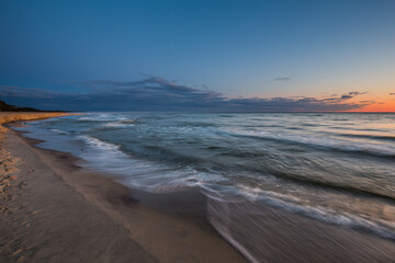 Travel photography of the Baltic sea coastline.Amazing sunrise over the Sea. Jastrzebia Gora, Poland.