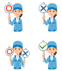 正解と不正解の札を持った作業着の女性
