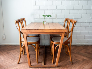 Fototapeta na wymiar Wooden dining table and four chairs.