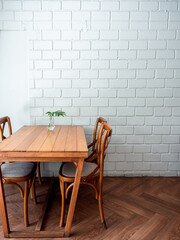 Wooden dining table and four chairs.