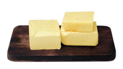 Butter on wooden board isolated on white background