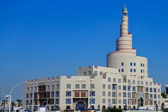 Al Fanar Mosque, nicknamed the Spiral Mosque, on a sunny day with a bright blue sky