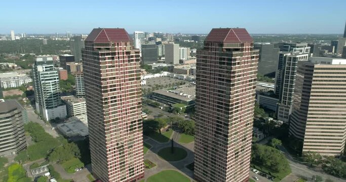 Aerial view of buildings and the surrounding area in Uptown Houston. This video was filmed in 4k for best image quality.