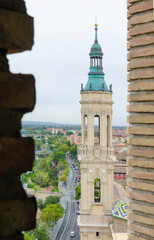 Fototapeta premium view of one of the towers of the Pilar de Zaragoza basilica in Spain