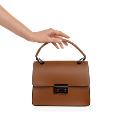Woman holding stylish handbag on white background, closeup