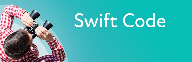 Fototapeta premium Swift Code. Businessman (man) looks through binoculars. Birds eye view. Focus on text. Blue Background. Business, Finance, Statistics, Analysis, Economy