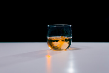 Drink toasting with whiskey glass