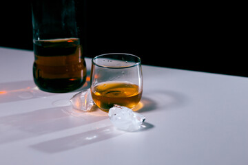 glass of whiskey and ice