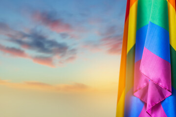 Pride community flags at sunset. Perfect banner, background for pride month. 