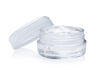 Jar of transparent cosmetic gel on light background