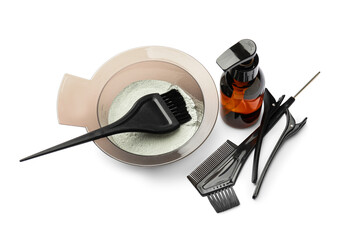 Supplies for hair coloring on white background