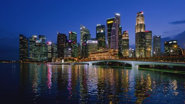 Singapore skyline and esplanade at dusk.