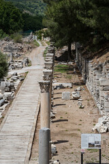 Fototapeta premium The ruins of the ancient antique city of Ephesus the library building of Celsus, the amphitheater temples and columns. Candidate for the UNESCO World Heritage List 