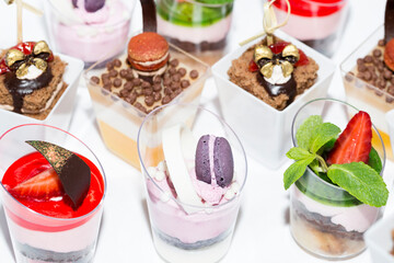 Mini snacks for buffet and banquet in a plastic bowl on a white background.