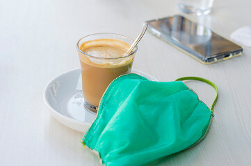 MASK AND COFFEE WITH MILK