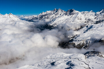 Fototapeta na wymiar Switzerland snow mountain summit aerial view scene