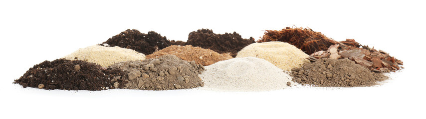 Heaps of different soils on white background