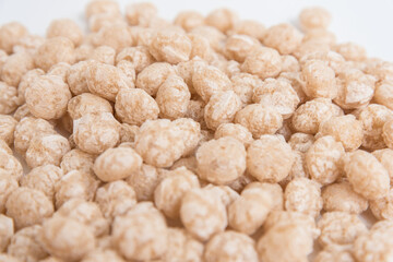 Balls for Breakfast, a side view. background texture. Beige shades.