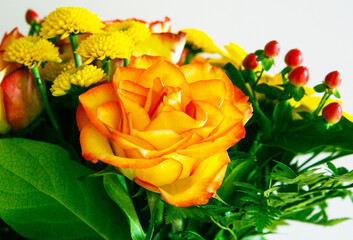 close-up of colorful bouquet with orange roses