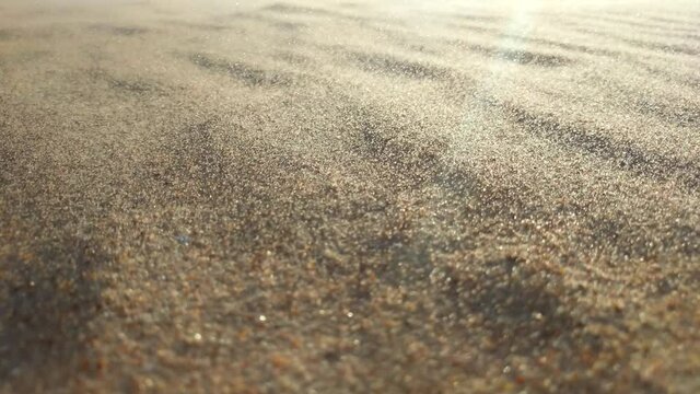 Cave storm in the desert. Sand waving in the wind in dunes in desert. Sand dunes Arabian desert. Sand dunes wave pattern. 