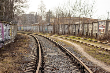 Fototapeta na wymiar Industrial zone with fences and railways 