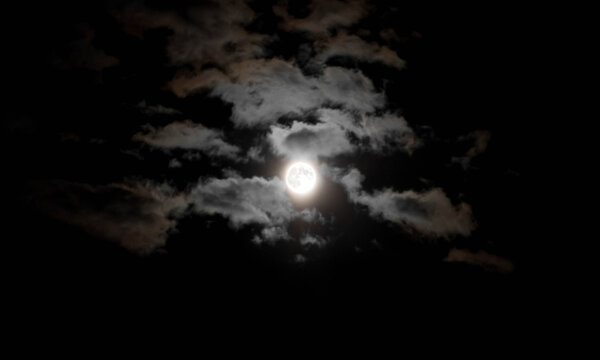 Full Moon And Lots Of Clouds. Close Up. Night Shot