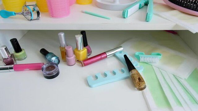 Personal care, for the beautiful. nail polish, curlers, on a white background