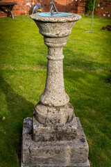 Old sundial in garden