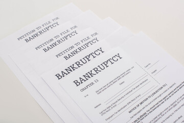 bankruptcy papers on white background with copy space
