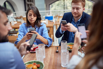 Business cowokers busy on the phone