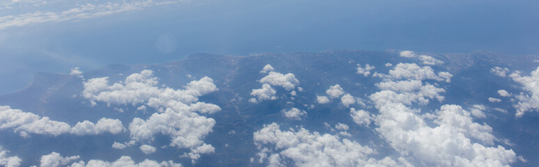 Aerial view of clouds above sea and Catalonia, Spain, panoramic shot © LIGHTFIELD STUDIOS