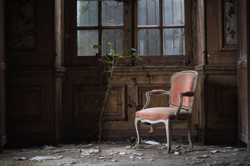 Fototapeta na wymiar old chair in abandoned castle