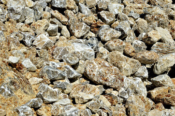 Natural gray gypsum stone. Close up image of stones with black and white. Industrial mining area. Limestone mining, quarry - Imagen