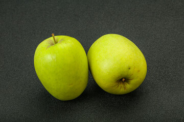Two ripe green sweet apples