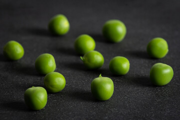 fresh peas on stone slate