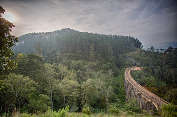 railway bridge in the evening in the mountains