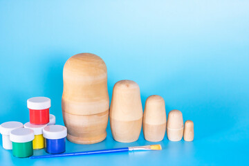 Wooden birch blanks of Russian nesting dolls for coloring. Folk art. Children's crafts