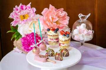 Delicious sweet buffet with cupcakes, Sweet holiday buffet with cupcakes and meringues and other desserts