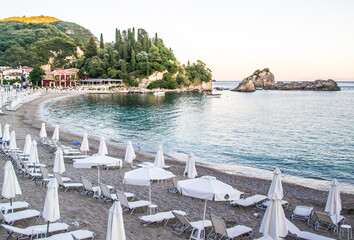 Idyllic Beach With Sunbeds And Umbrellas In Parga, Greece