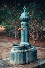 Fountain of drinking water - Old pump room, located in the park 