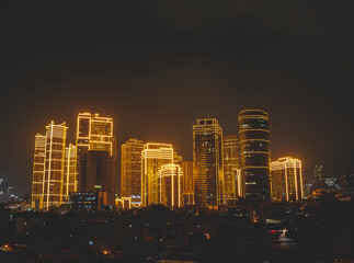Fototapeta na wymiar Metro Manila, Philippines at night with lots of lights