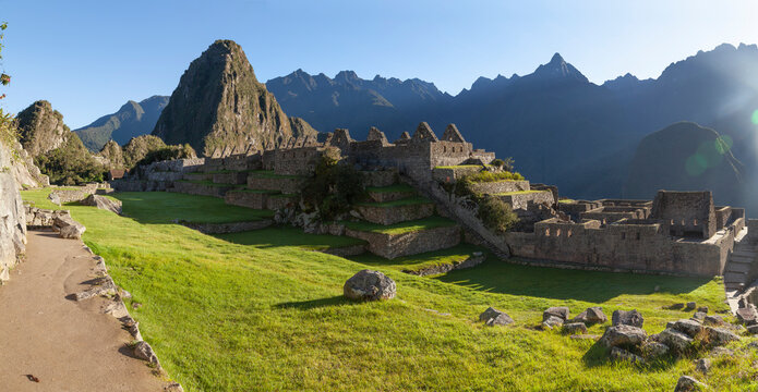 Dawns at Machu Picchu, from main square, ancient Inca town, built before the fifteenth century, located in the southern Cordillera Oriental of Peru, in the Andes, Sacred Valley of the Incas, Cusco.