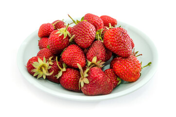 tasty strawberries in a plate on a white background. Close-up. Ukrainian strawberry.