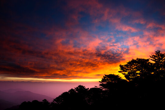 Sandakphu sunrise. Sandakphu (3665 m; 11,930 ft) is the highest point of the Singalila Ridge in the district of Ilam, Nepal on the West Bengal-Nepal border