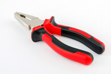 The pliers are red and black on a white background