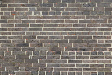 Brown background of beautiful unusual building brick