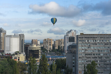 hot air balloon over the city